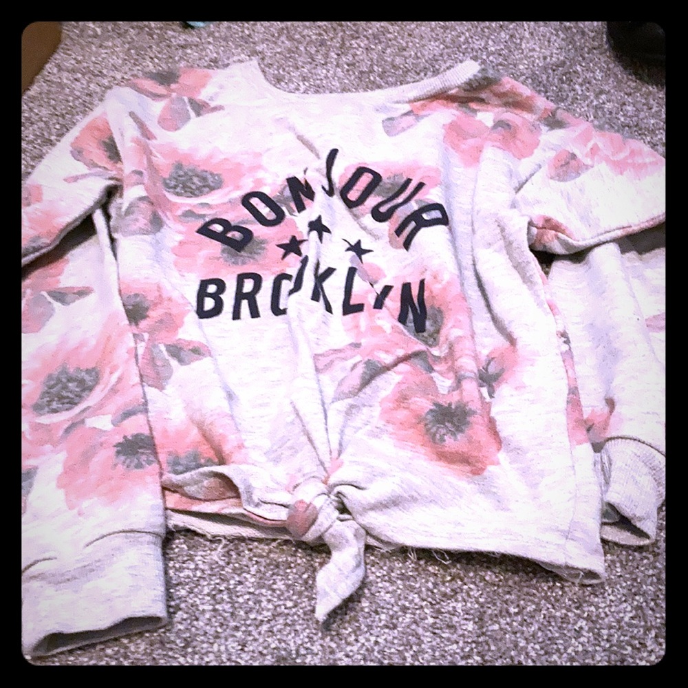 Long sleeve shirt with flowers and writing